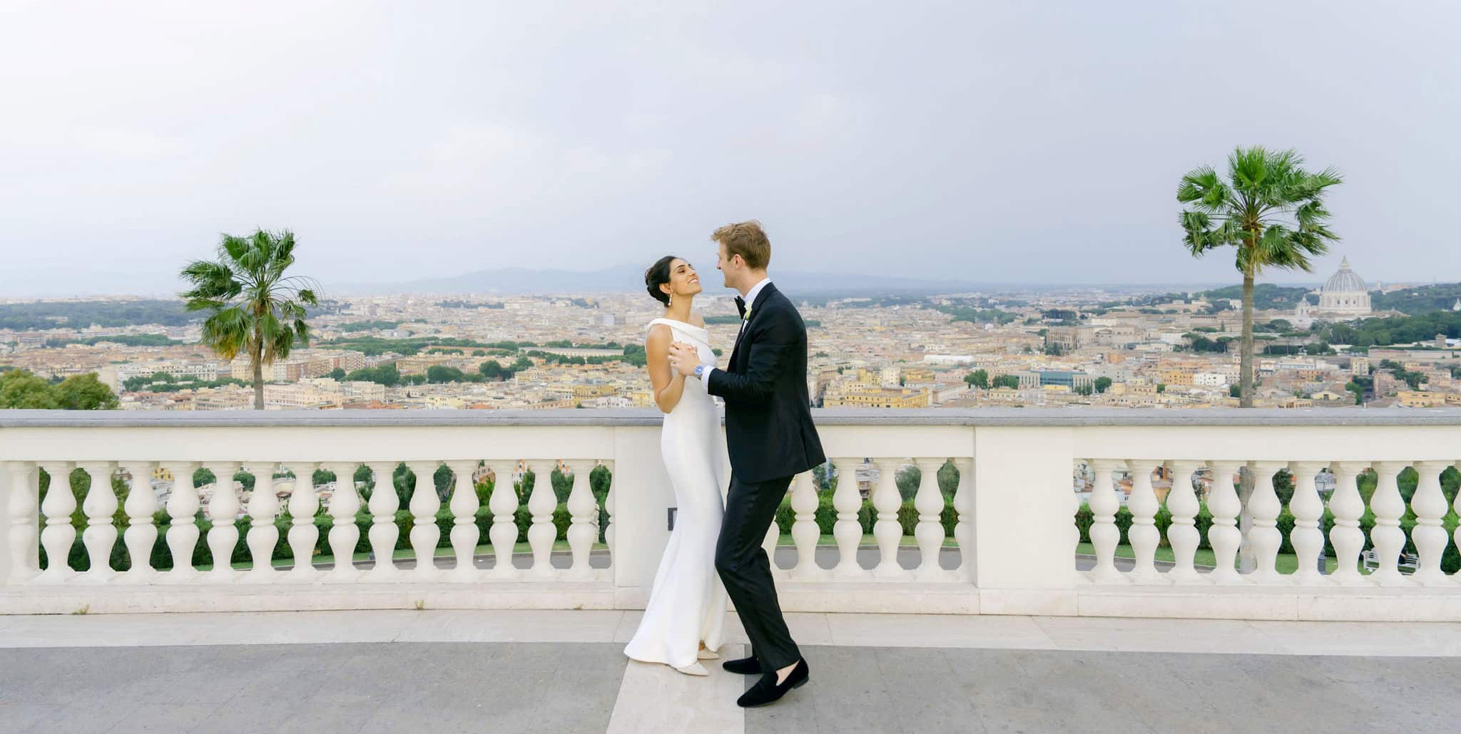 Bride and groom dance at the wedding villa in Rome