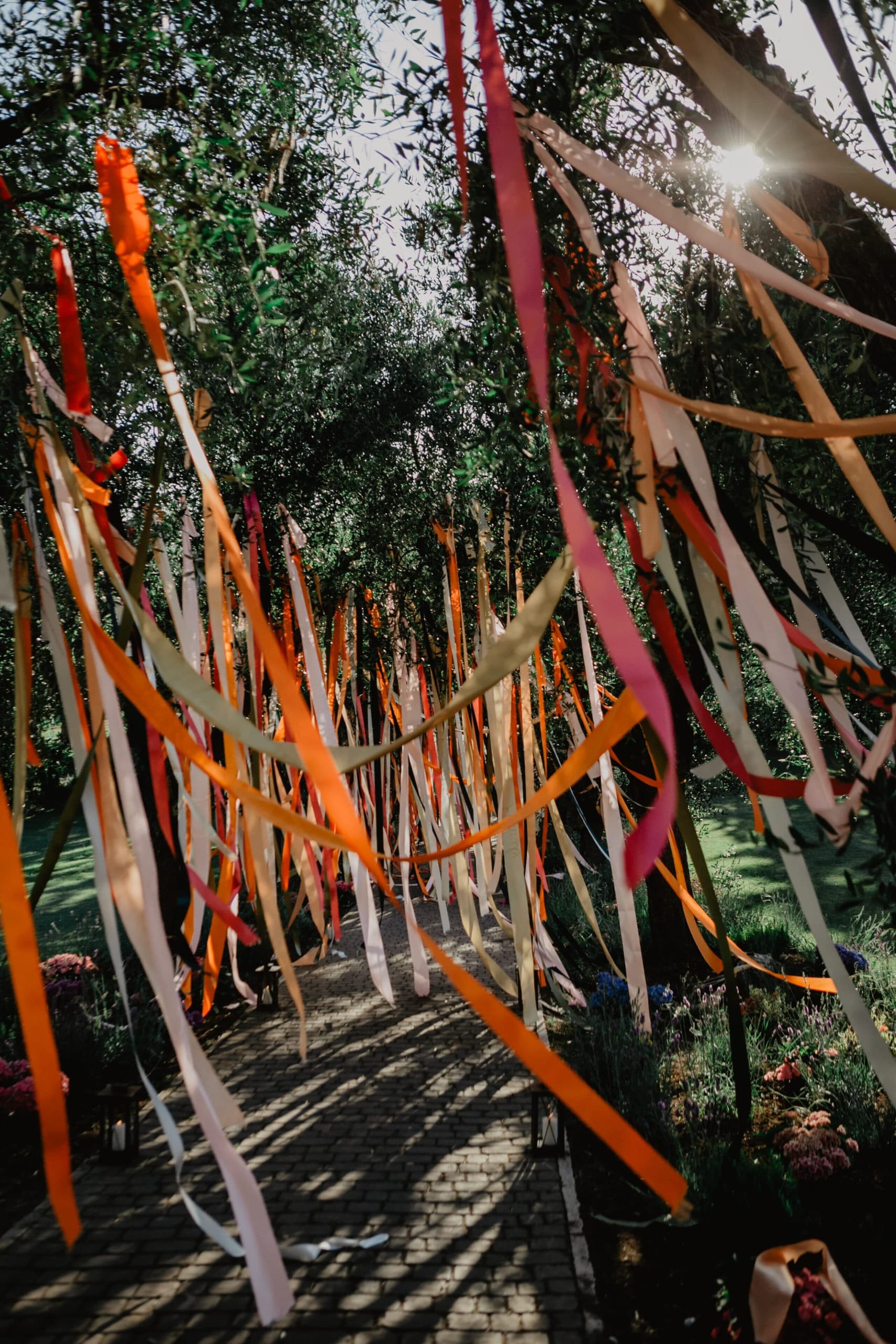Hanging colored ribbons to decor the dinner entrance