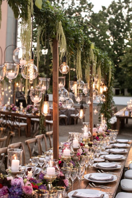 Wedding table with bulblights and hanging candles