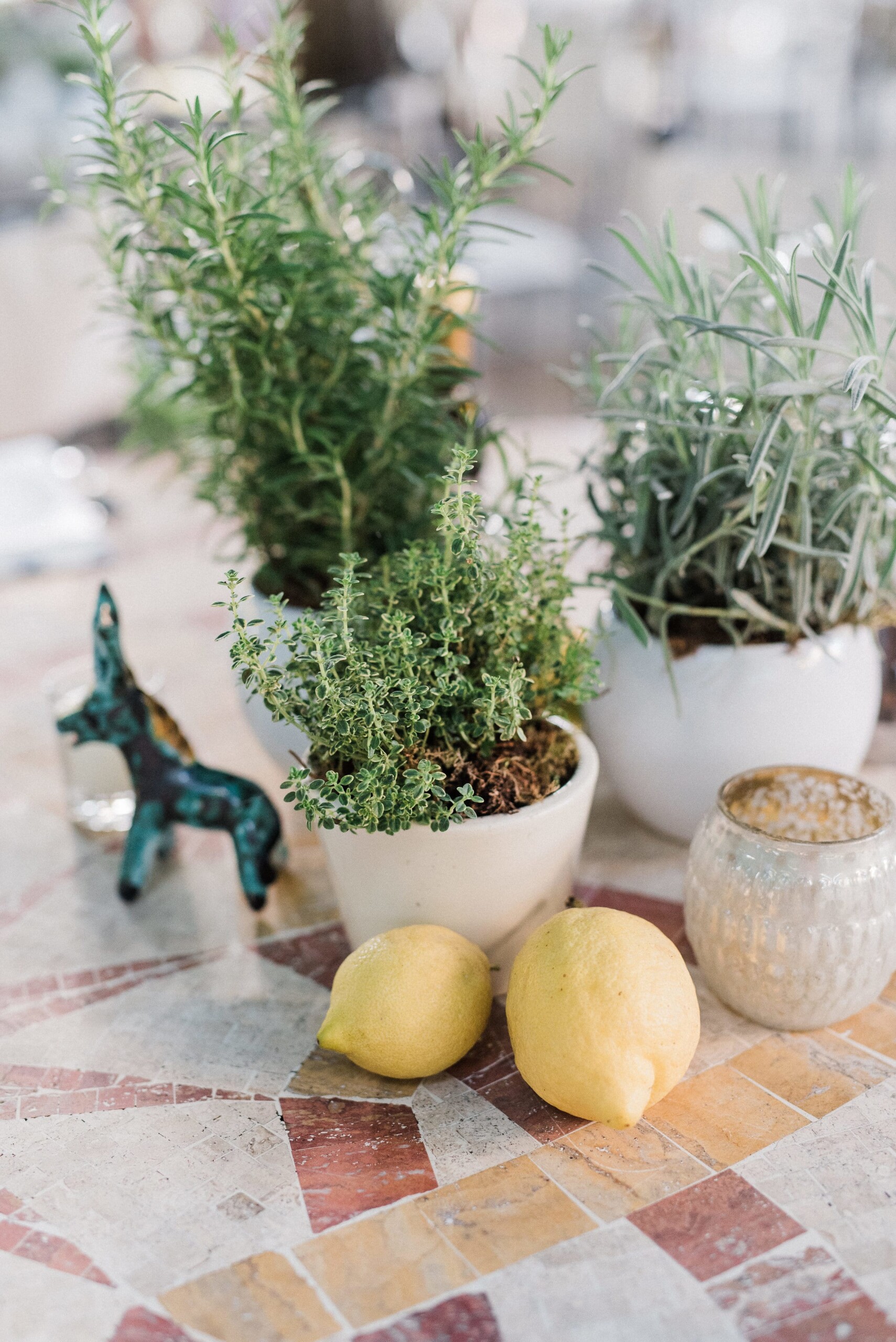 Table decor with lemons and herbs
