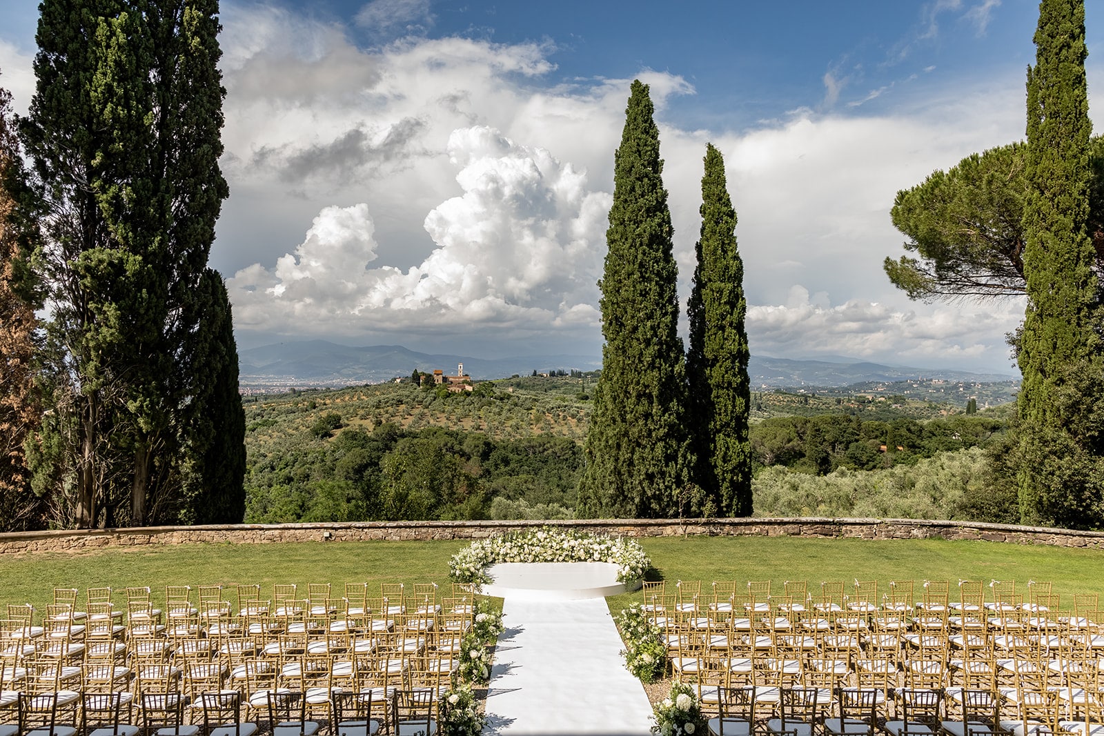 Panoramic view of ceremony at exclusive villa for weddings in Tuscany