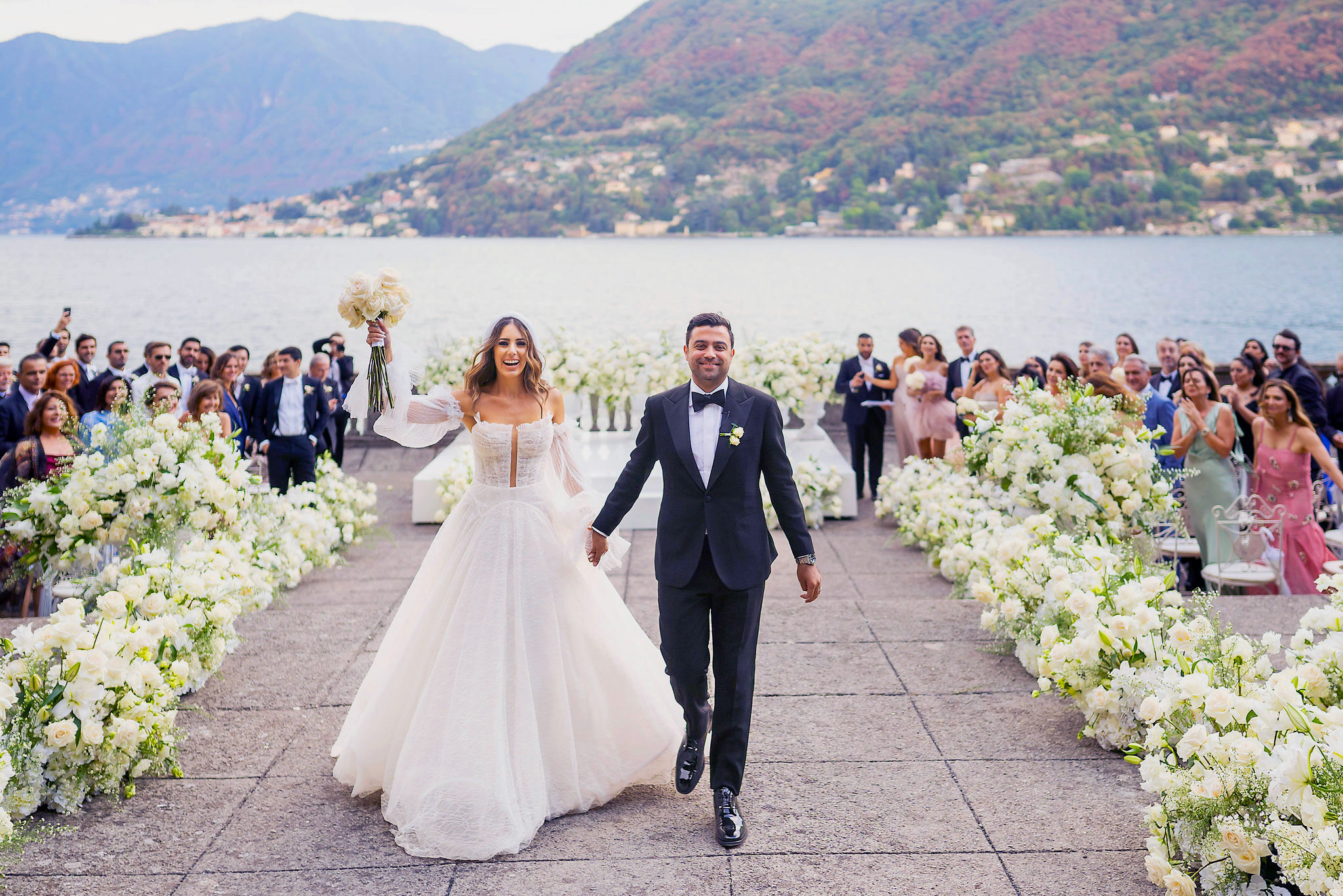 Bride and groom recessional at the wedding villa on Lake Como