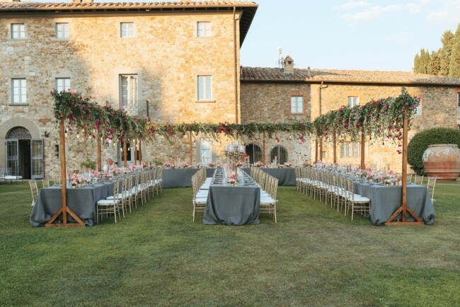Tables with hanging decor at elegant wedding villa in Italy
