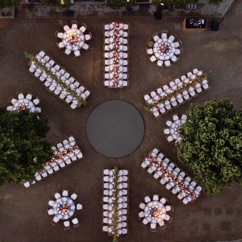 Top view of rectangular and round tables of a Tuscan wedding villa