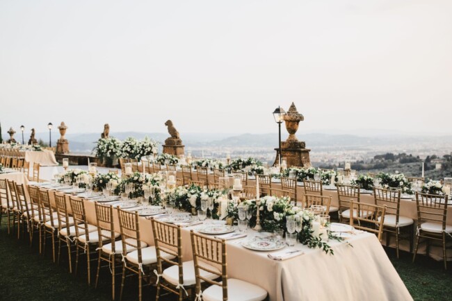 White and green decor on tables at wedding villa with view in Florence