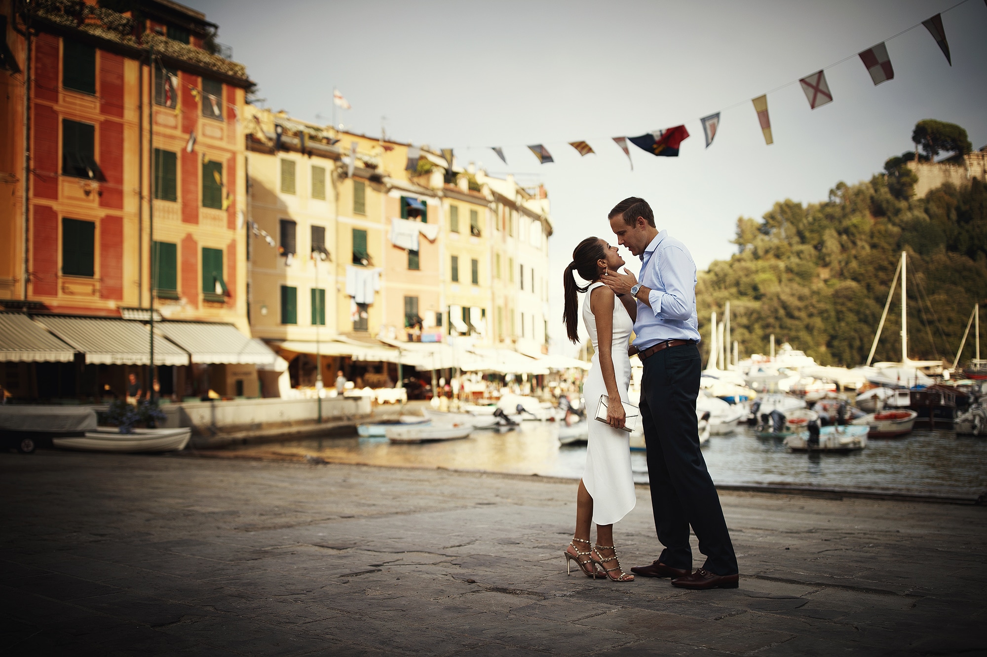 The newlyweds kiss during their small luxury wedding in Portofino