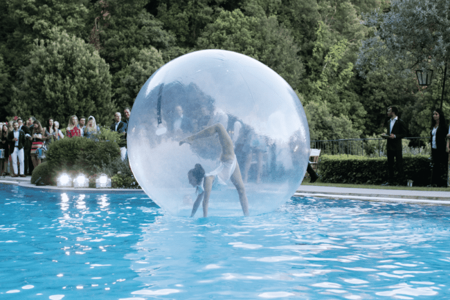 Dancing inside the ball on the water