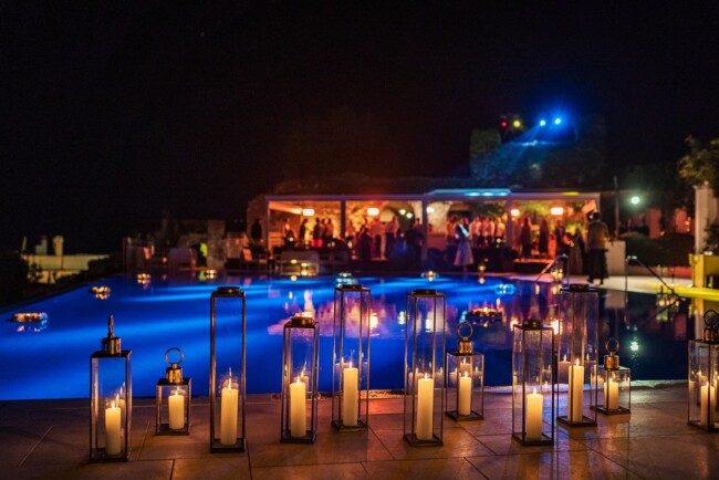 Pool party with lanterns and floating candles