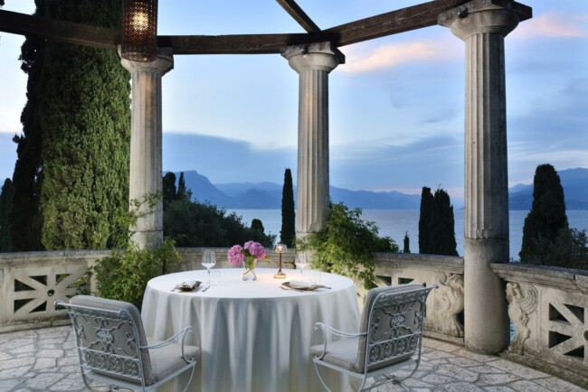 Romantic dinner at sunset of Lake Garda hotel