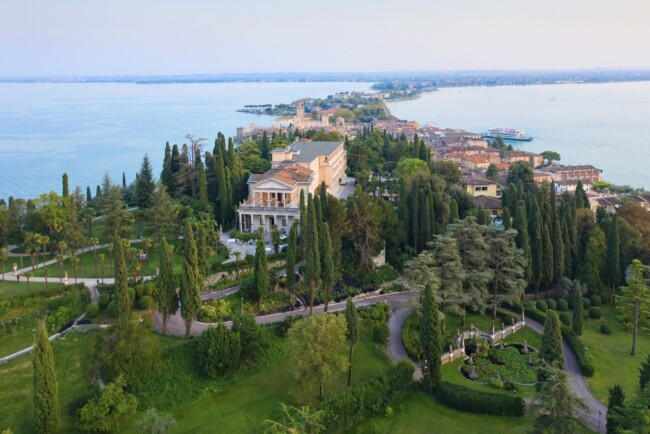 View of facade and gardens of Lake Garda wedding hotel