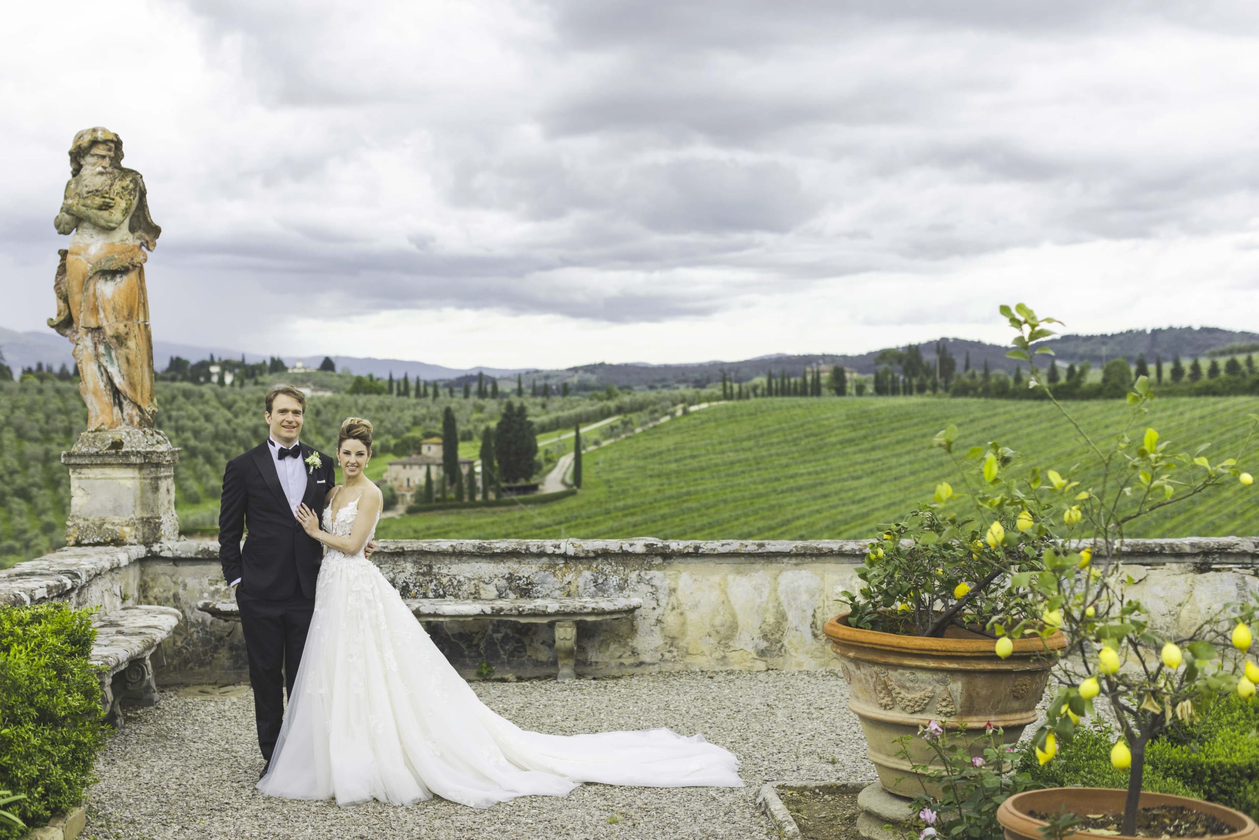 Bride and groom in the garden of the Italian vineyard wedding venues