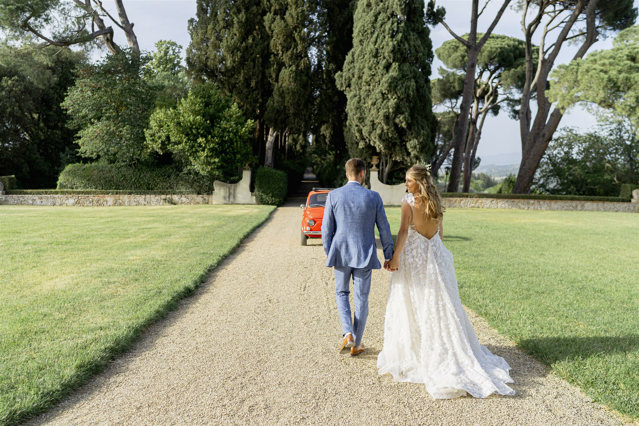 Bride and groom with vintage five hundred at theItalia vineyard wedding venues